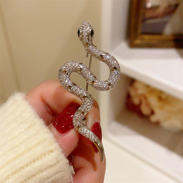 Elegant diamond snake brooch