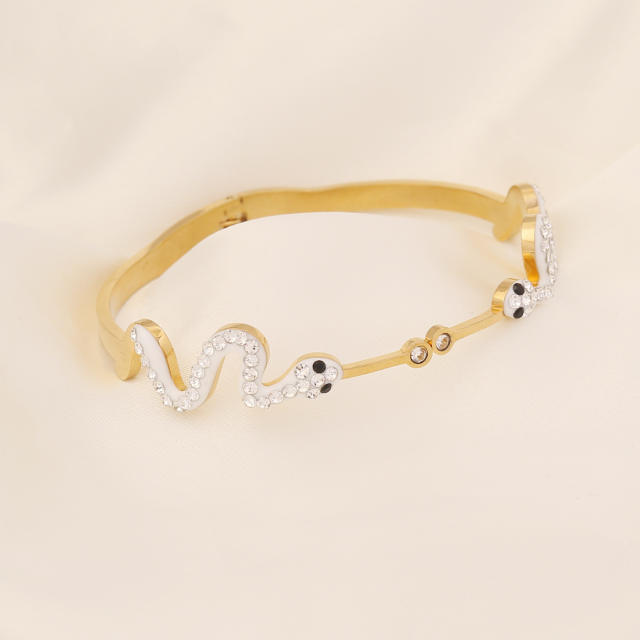 Butterfly heart symbol stainless steel bangle