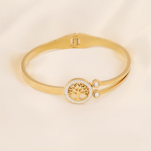 Butterfly heart symbol stainless steel bangle