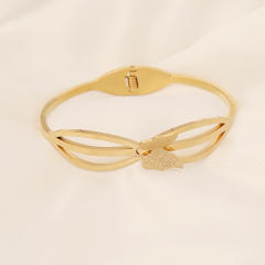Butterfly heart symbol stainless steel bangle
