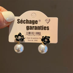 Korean fashion black enamel flower pearl earrings