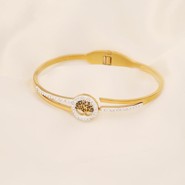 Butterfly heart symbol stainless steel bangle