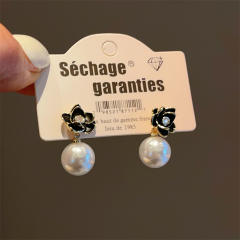 Korean fashion black enamel flower pearl earrings