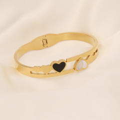 Butterfly heart symbol stainless steel bangle