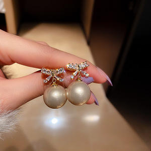 Real gold plated diamond bow pearl earrings