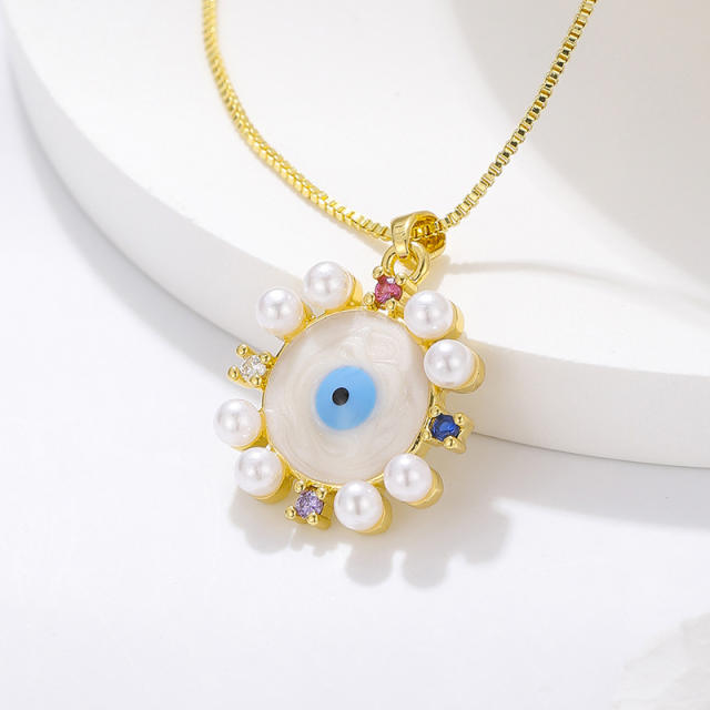 White pearl bead pendant evil eye necklace