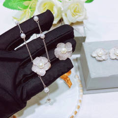 Luxury pave setting diamond camellia series jewelry set