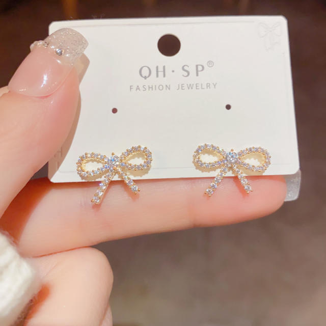 Korean fashion elegant hollow bow pearl earrings