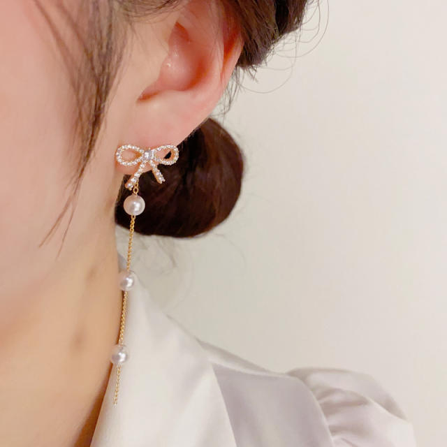 Korean fashion elegant hollow bow pearl earrings