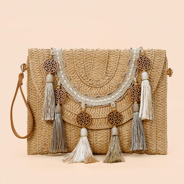 INS vintage tassel straw clutch