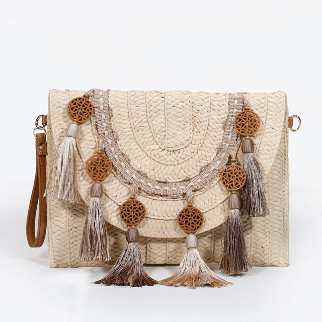 INS vintage tassel straw clutch