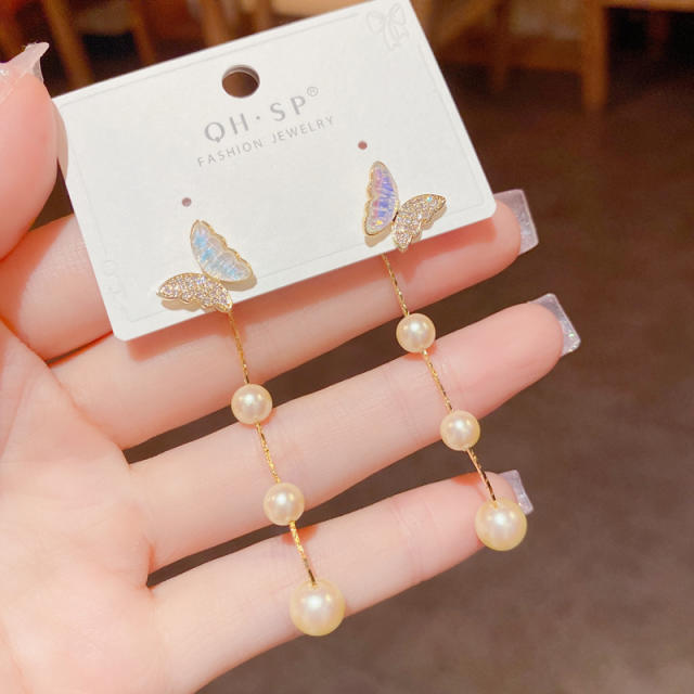 Elegant pearl butterfly jacket earrings