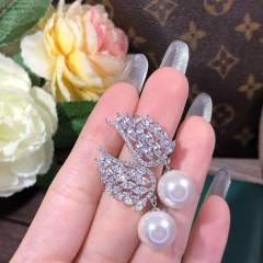 Pearl drop angel wing diamond earrings