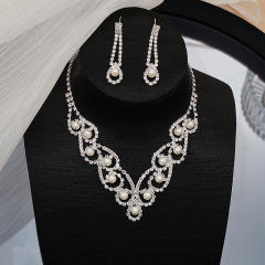 Elegant pearl rhinestone setting hollow jewelry set