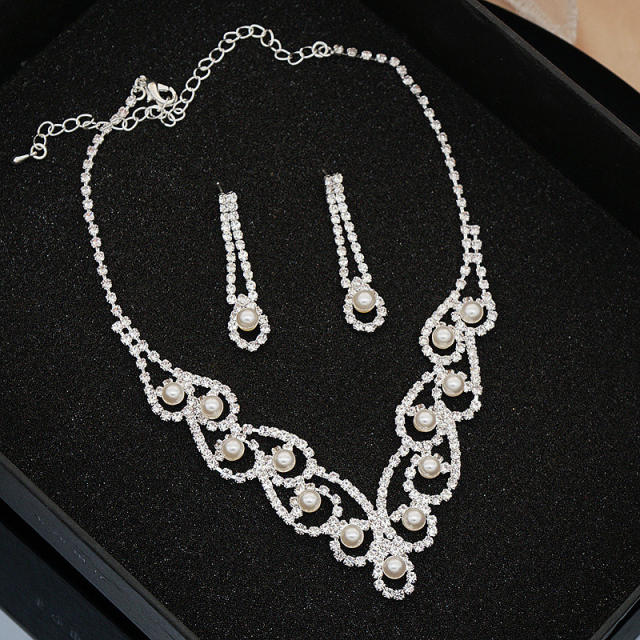 Elegant pearl rhinestone setting hollow jewelry set