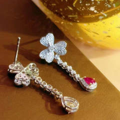 Elegant diamond clover drop earrings
