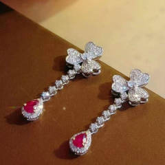 Elegant diamond clover drop earrings