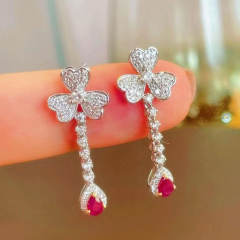 Elegant diamond clover drop earrings