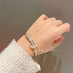 Delicate cubic zircon setting gold plated copper bangle