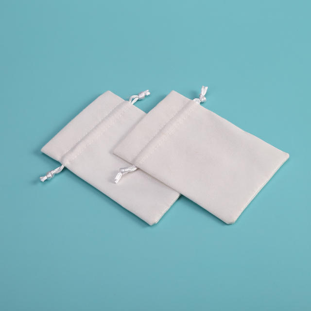 White color suede jewelry bag
