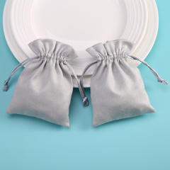 Gray color string jewelry bag