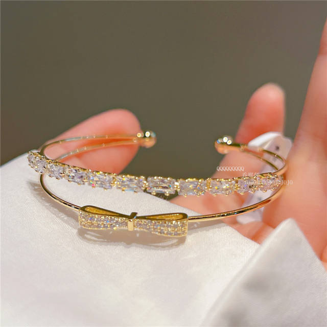 Real gold plated cubic zircon bow copper bangle