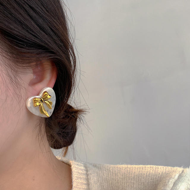 Concise gold color bow acrylic heart studs earrings
