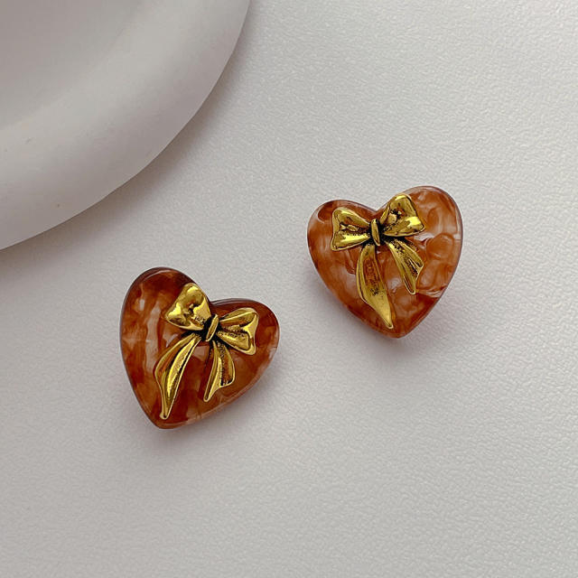 Concise gold color bow acrylic heart studs earrings