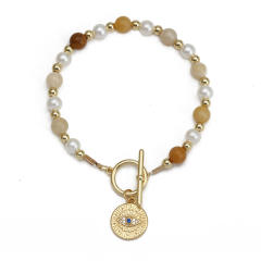 Boho natural stone pearl bead toggle evil eye bracelet
