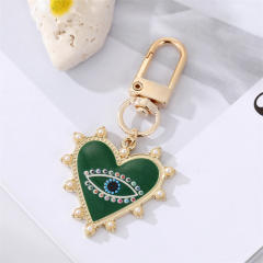 Hot sale color enamel heart evil eye keychain