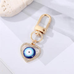Spring enamel rainbow evil eye heart keychain