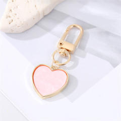 Spring enamel rainbow evil eye heart keychain
