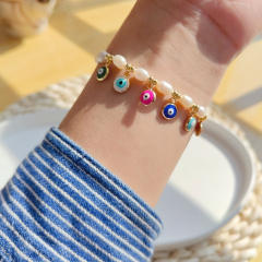 INS baroque pearl enamel evil eye charm bracelet