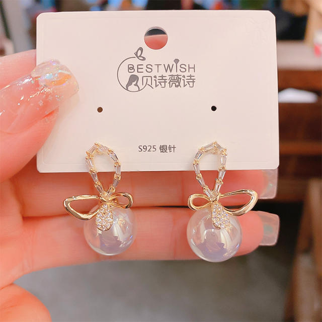 925 needle elegant hollow bow pearl studs earrings