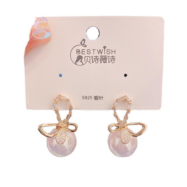 925 needle elegant hollow bow pearl studs earrings