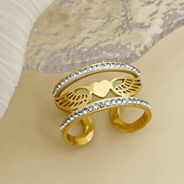 14K delicate angel wing wide hollow stainless steel rings
