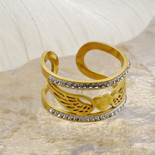 14K delicate angel wing wide hollow stainless steel rings