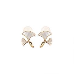 Gold plated mother shell ginkgo leaf clip on earrings