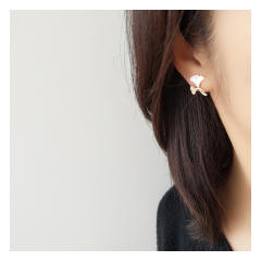 Gold plated mother shell ginkgo leaf clip on earrings