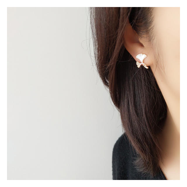 Gold plated mother shell ginkgo leaf clip on earrings