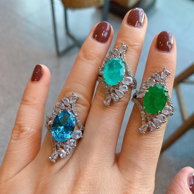 Elegant emerald statement copper rings