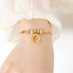 Delicate initial charm stainless steel slide bracelet