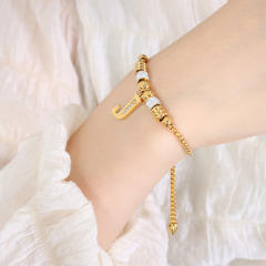 Delicate initial charm stainless steel slide bracelet