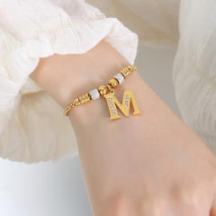 Delicate initial charm stainless steel slide bracelet