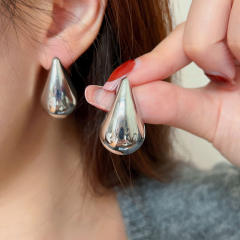 Chunky drop shape studs earrings
