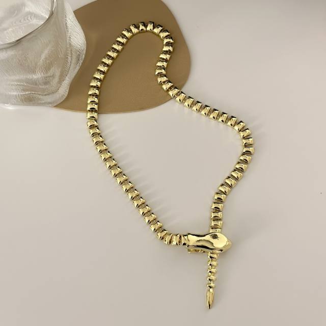 Unique gold color snake lariat necklace