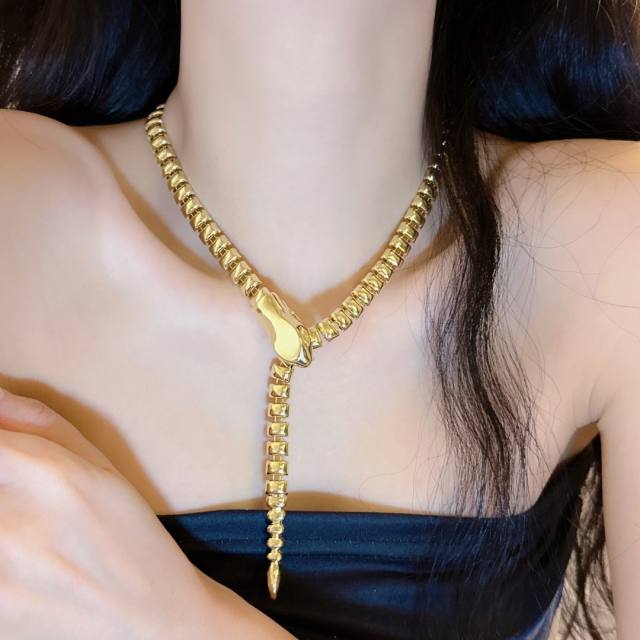 Unique gold color snake lariat necklace