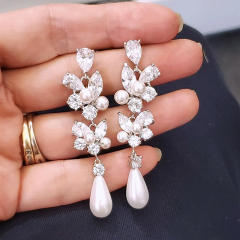 Elegant pearl bead drop diamond earrings