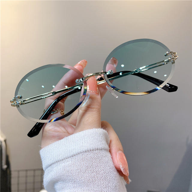 Cute oval shape rimless sunglasses