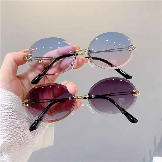Cute oval shape rimless sunglasses